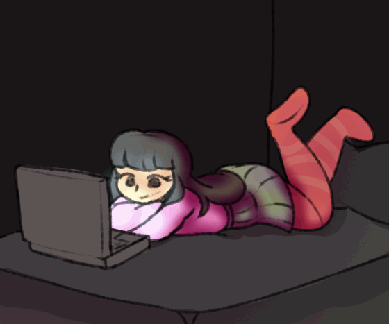 gif of Lydia (me) kicking my feet whilst looking at a laptop screen